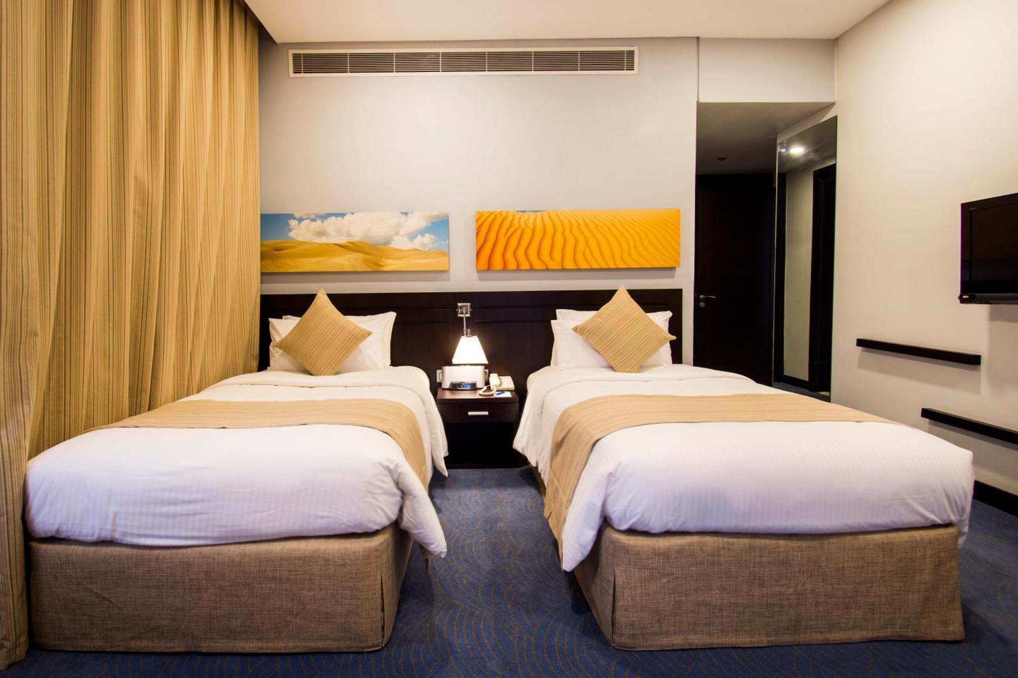 City Seasons Hotel & Suites Muskat Ruang foto